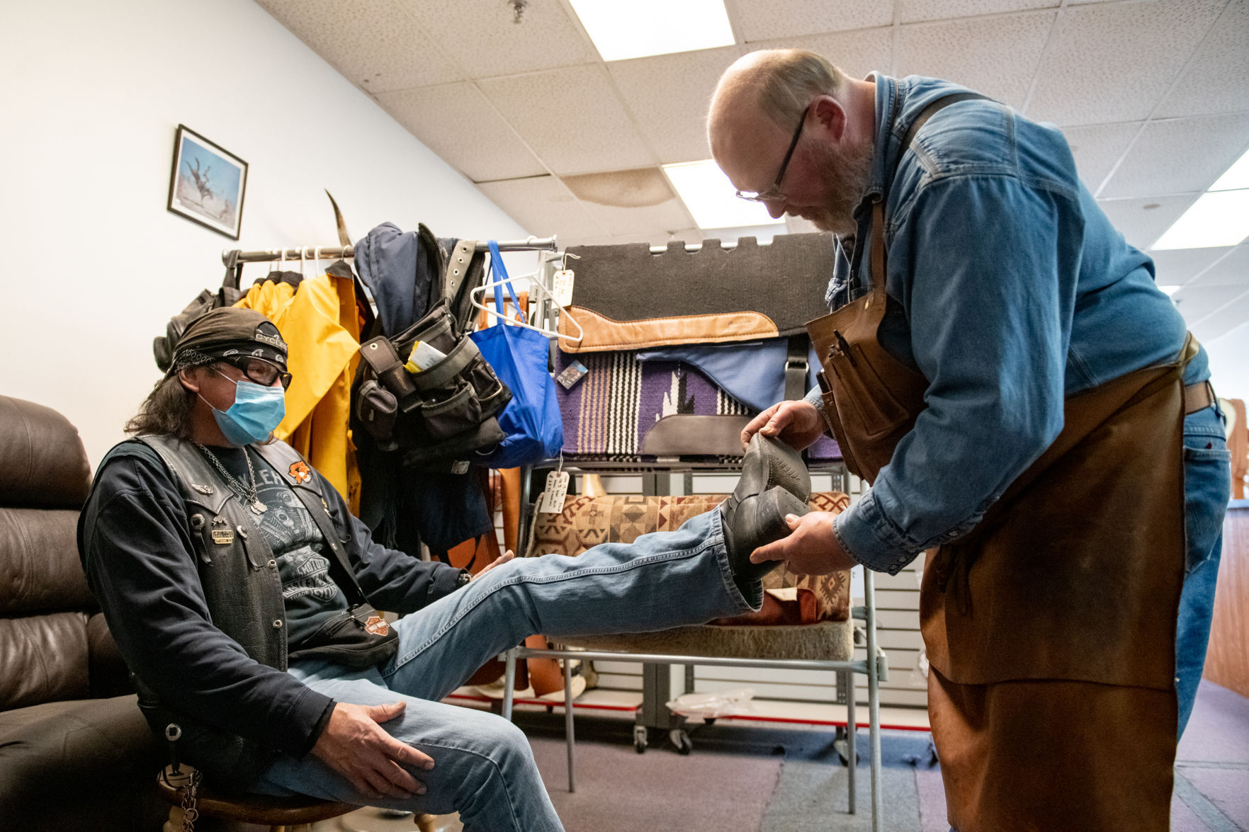 Cobbler Mark Treft with customer